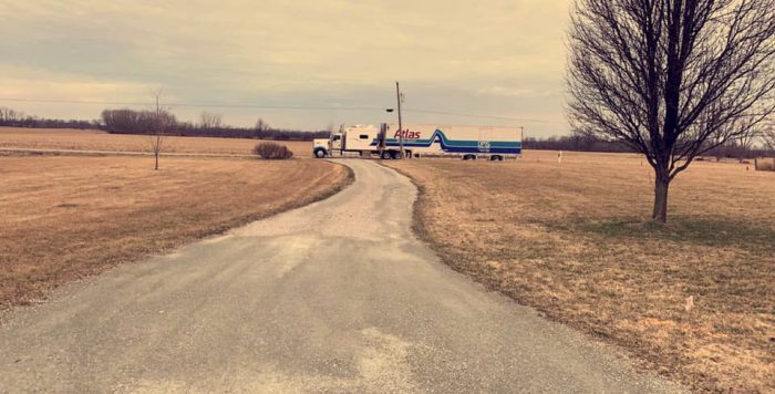 moving-truck-farm-road