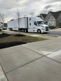 Moving truck outside a home