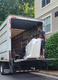 Bellhop Moving crew loading truck